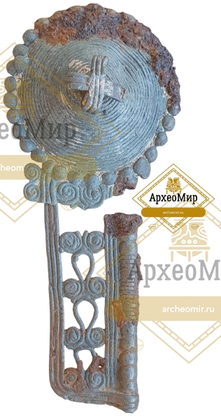 Ажурная биметаллическая булавка с умбоновидным навершием, дьяковская культура
